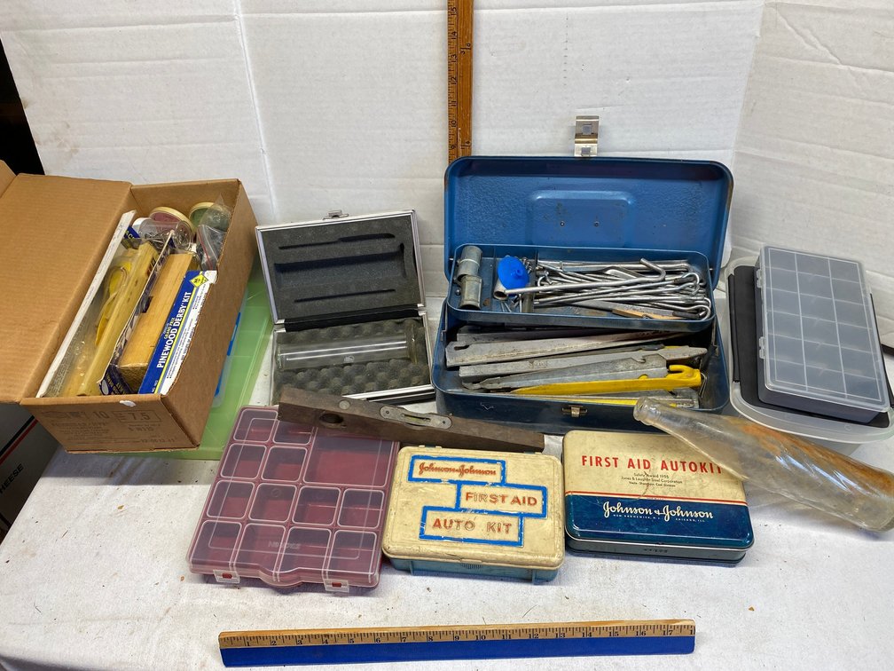 Tent stakes, Pinewood Derby kits, first aid kits, plastic small bins