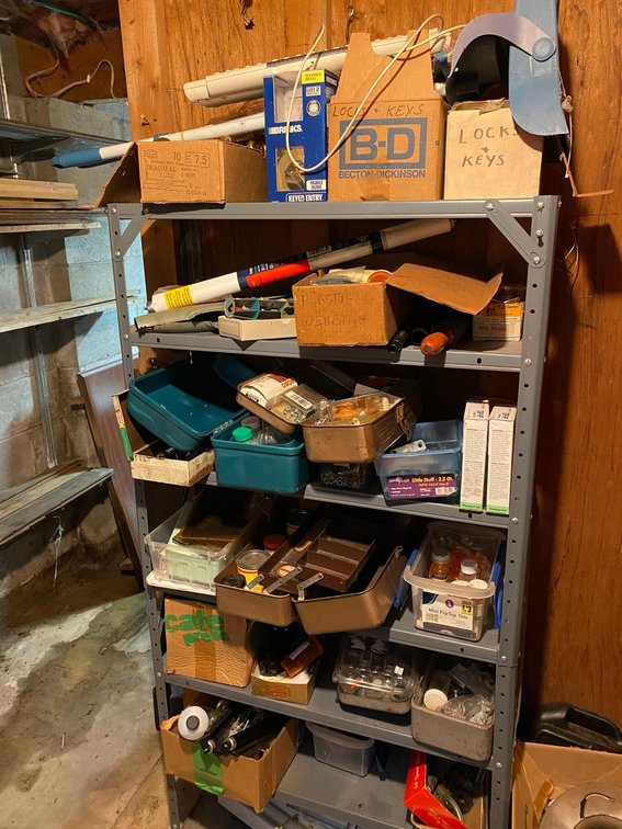Metal shelf with contents