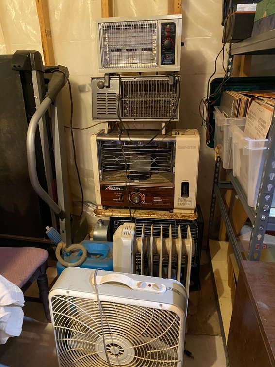 3 Kerosene heaters, 3 electric heaters, box fan, kerosene can