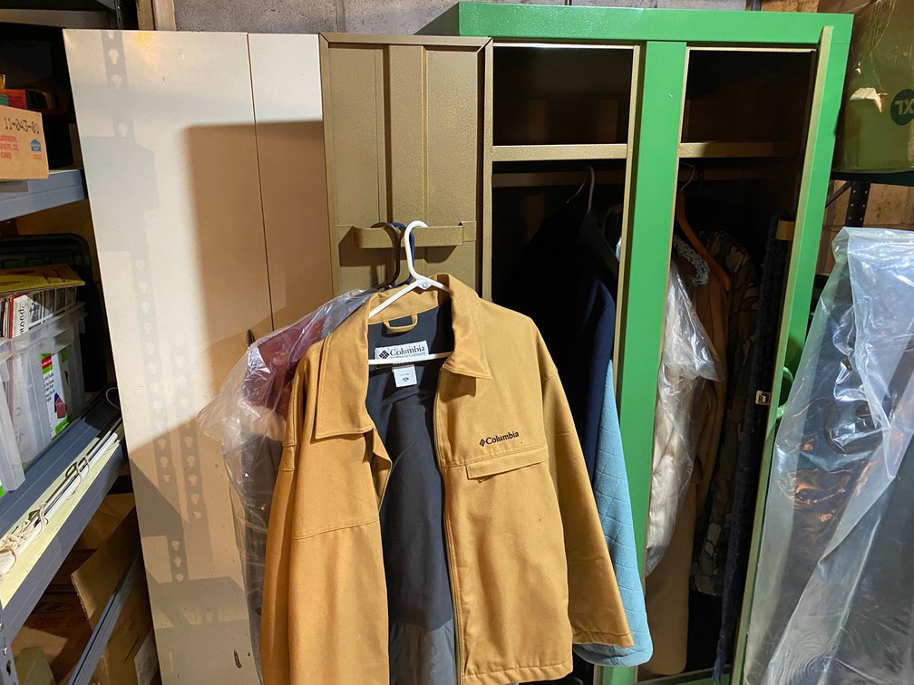 2 Metal cabinets with contents-1 is wardrobe with assortment of coats-green-20" deep x 29" wide x 64" tall, other is white-12" deep x 24" wide x 63" tall