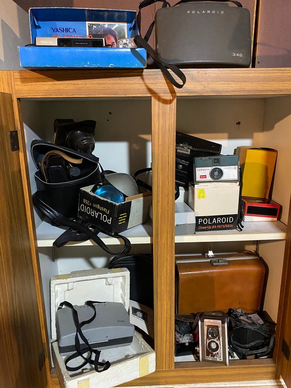 Assorted cameras and cases-Duraflex Kodak camera, Hawkeye Kodak, Polaroid model 210, Polaroid model 340, Yashica Palmatic camera