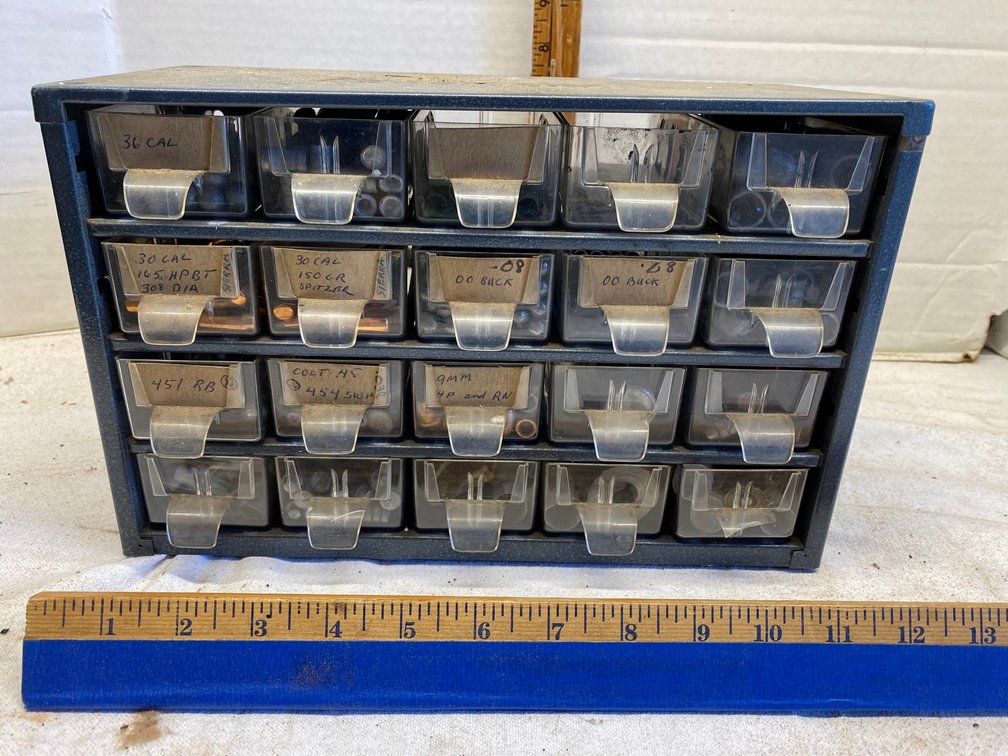 Powr-Kraft small parts bin with bullet tips for reloading