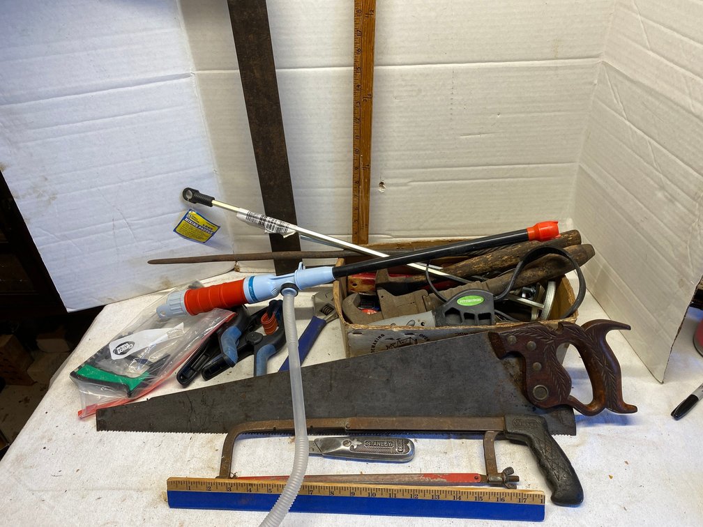 Hand saws, battery pump, squares, squeeze clamps, hacksaws