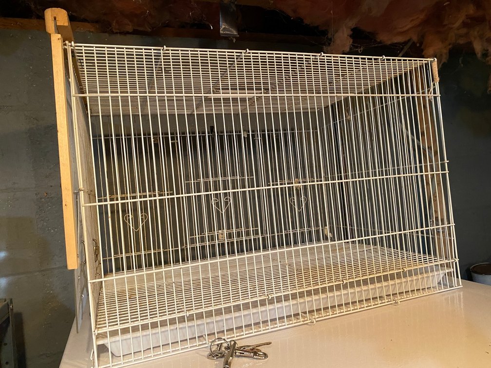 Bird cage with slide out tray