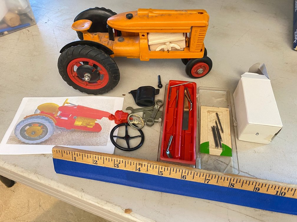 Vintage plastic tractor kit-missing some pieces including the motor