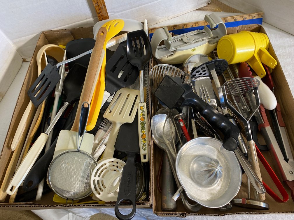 Kitchen utensils-spatulas, mashers, spoons, Tupperware measuring cups