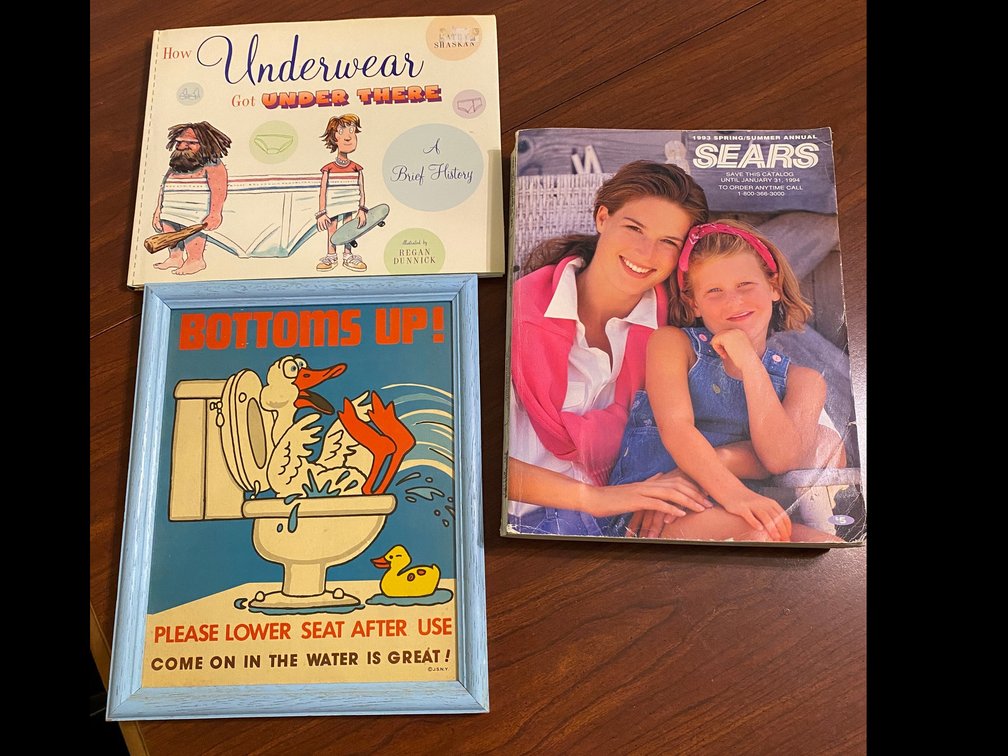 1993 Sears Spring & Summer catalog, framed print says Bottoms Up-9" x 11", How The Underwear Got Here book-A Brief History