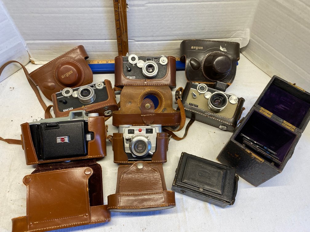 Assortment of vintage cameras-3 Argus cameras, Kodak-all with cases, Zeiss Iron camera