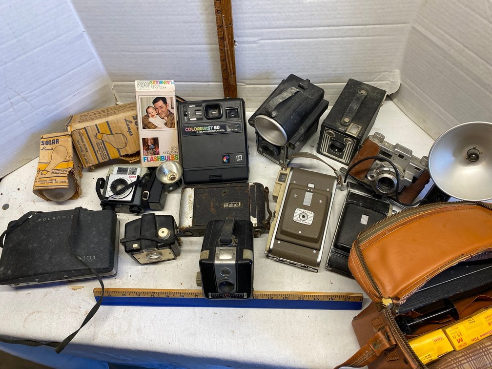 Assortment of vintage cameras-Polaroid Land camera, Brownie Target 620, Kodak 35, Polaroid 101, Kodak Brownie Star Meter, Kodak Colorburst 50 and more-all in tote with lid