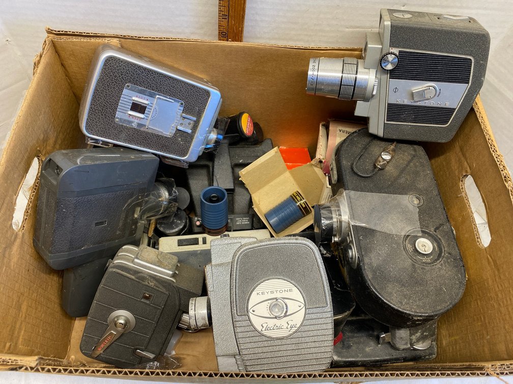 Assortment of cameras and accessories- Keystone Auto Zoom, Keystone-no model, Holiday model 1E and more