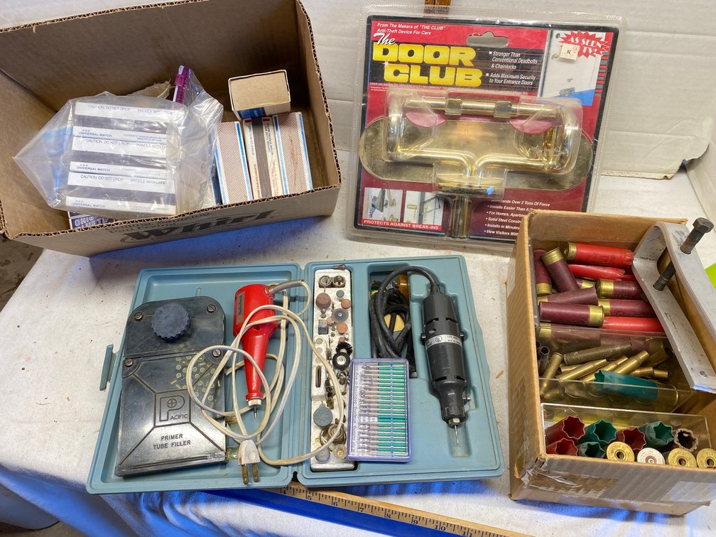 Dremel tool, electric engraver, empty shotgun shell cartridges, matches, The Door Club