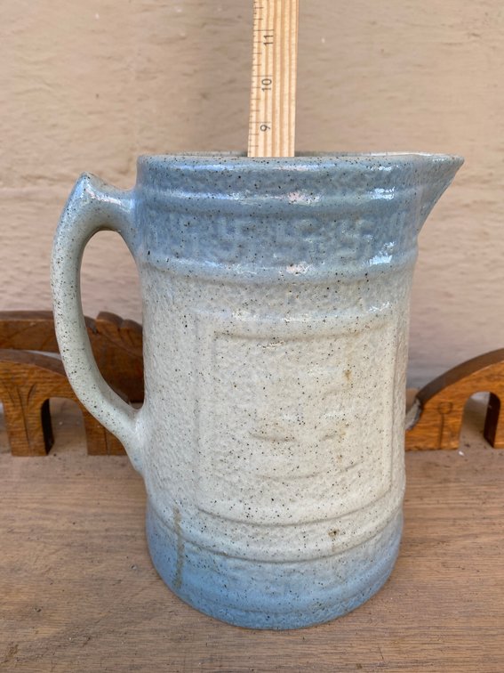 Stoneware pitcher with Swastikas