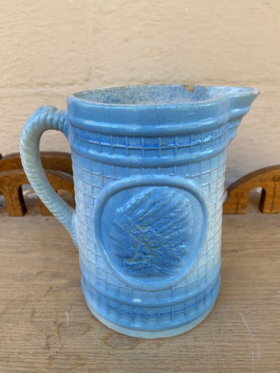 Stoneware pitcher with embossed Native American Chief decoration