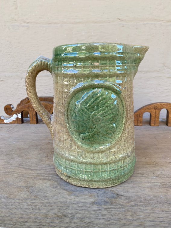 Stoneware pitcher with embossed Native American Chief decoration