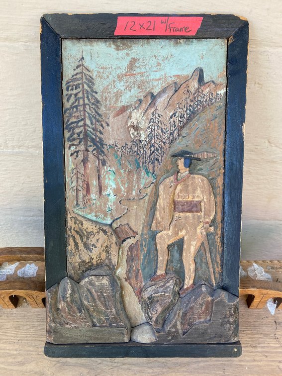 Carved wooden relief wall hanging