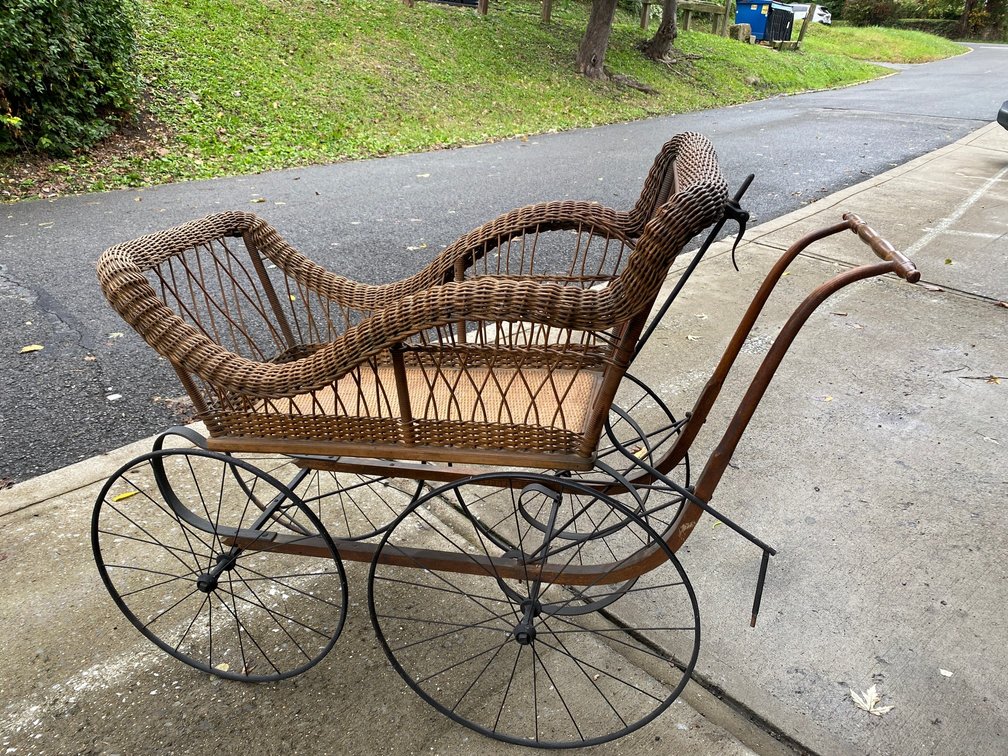 Victorian era baby buggy-wicker and metal