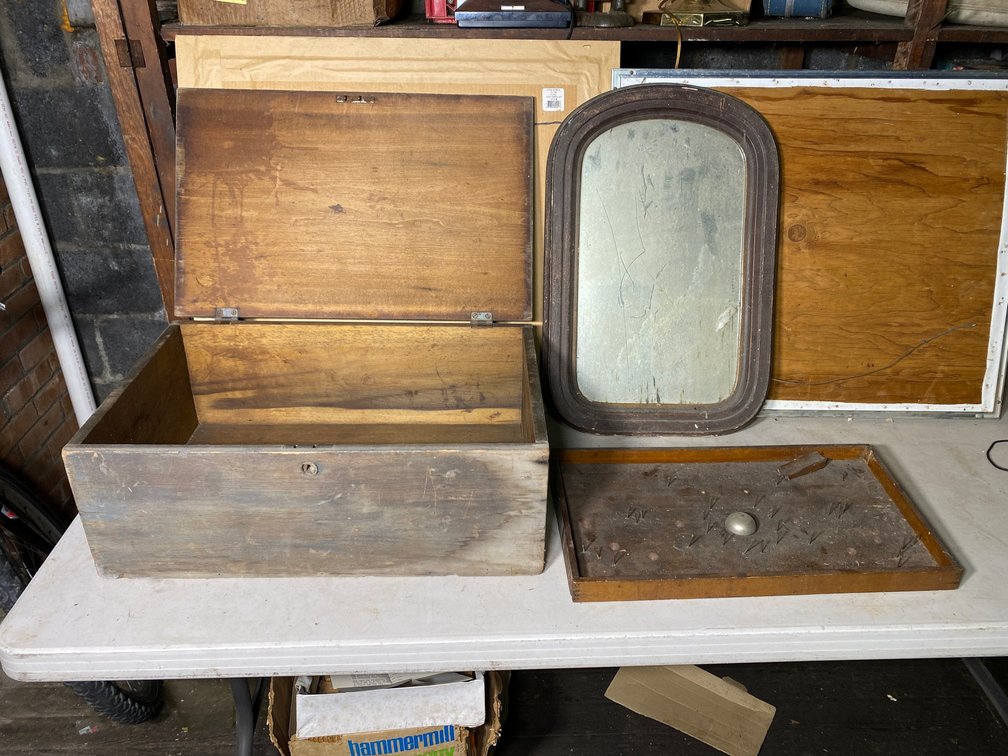 Primitive wooden box, wall mirror, wooden game