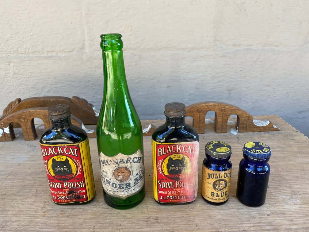 Old bottles with paper labels