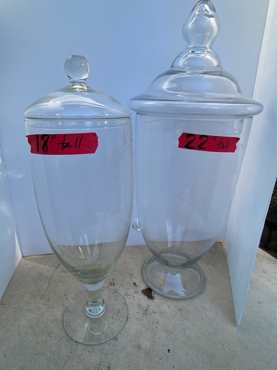 2 Tall glass candy dishes with lids