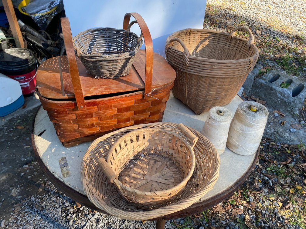 Picnic basket, wicker baskets, spools of string, misc.