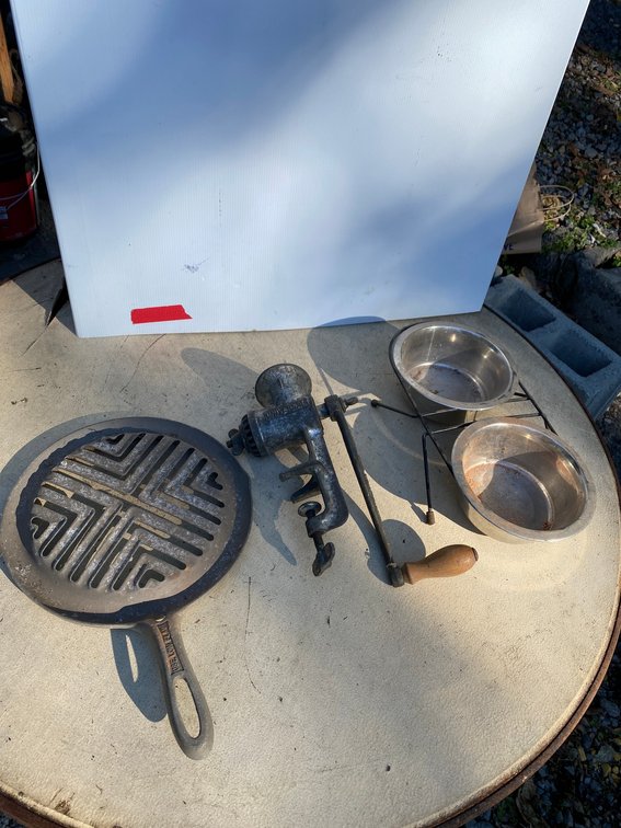 Stainless steel dog food and water bowls, sausage grinder, cast iron griddle