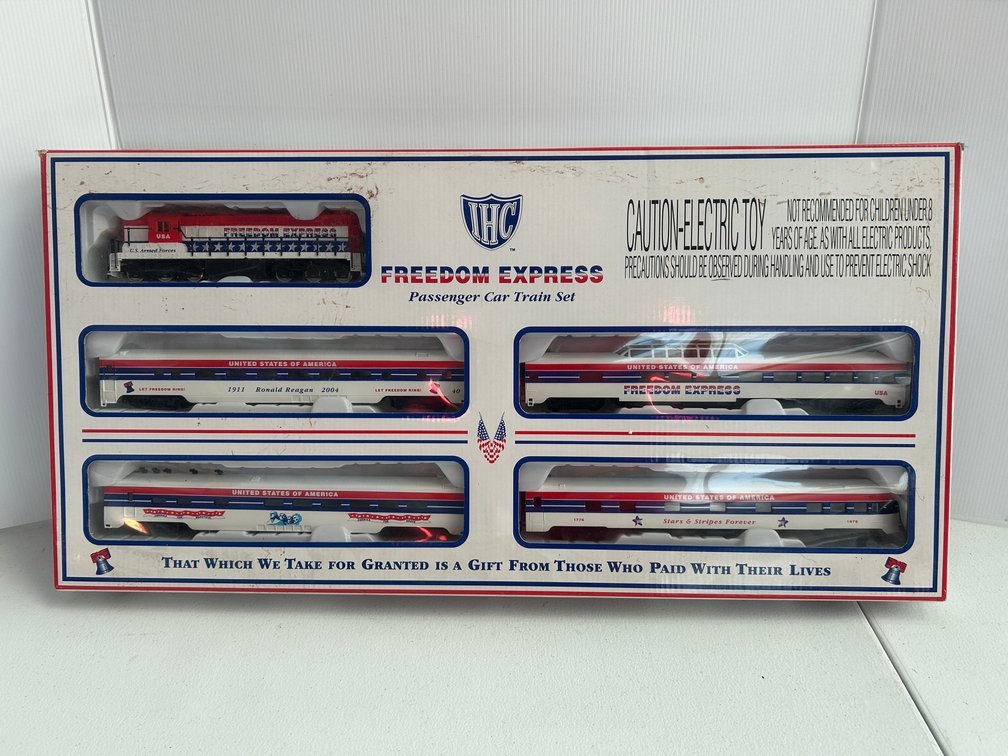 IHC Freedom Express passenger car train set with diesel locomotive