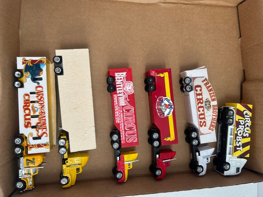 Selection of HO Scale tractor and trailer circus themed trucks