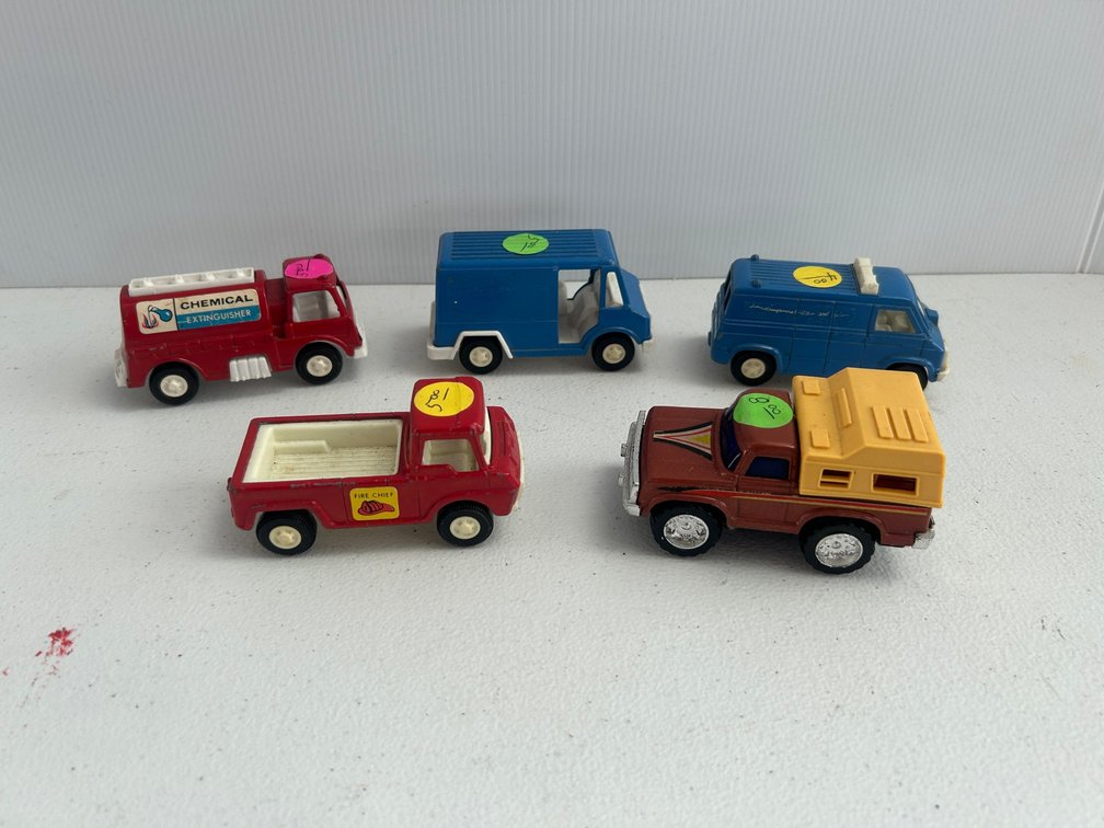 Selection of small vintage toy trucks