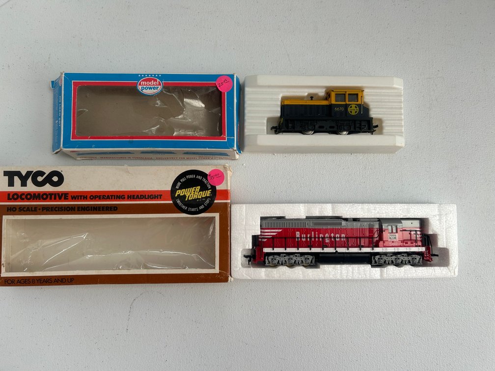 2 HO Scale diesel locomotives, Model Power branded switcher, Tyco branded Burlington  SD9