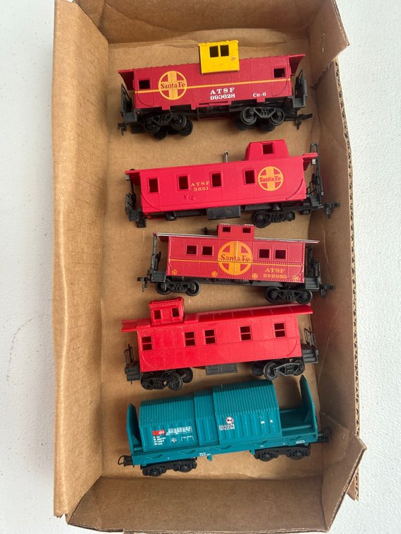 Selection of Santa Fe cabooses, steel roll carrier car