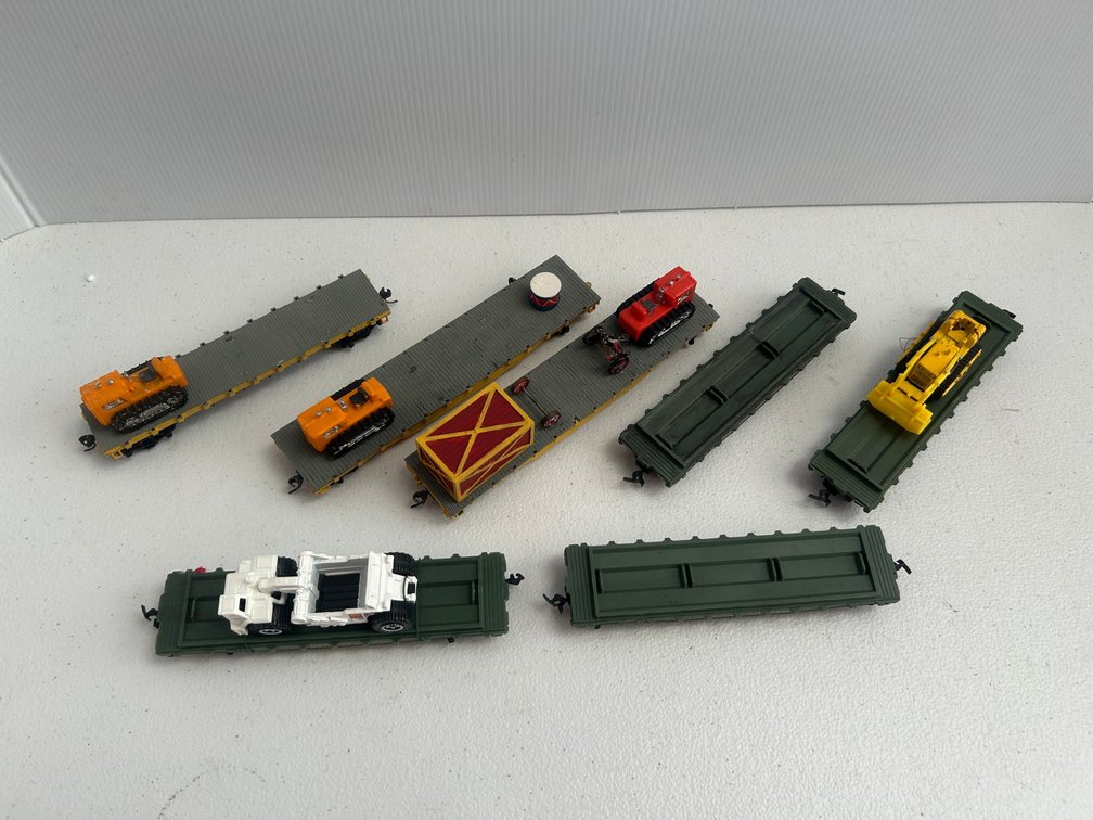 Selection of railway flat cars with loads