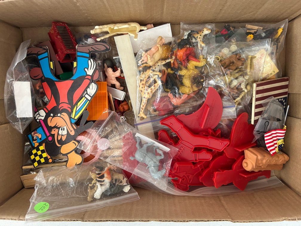 Selection of vintage toys and figures
