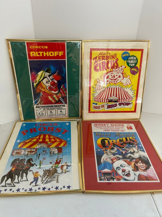 Selection of circus advertising posters in frames