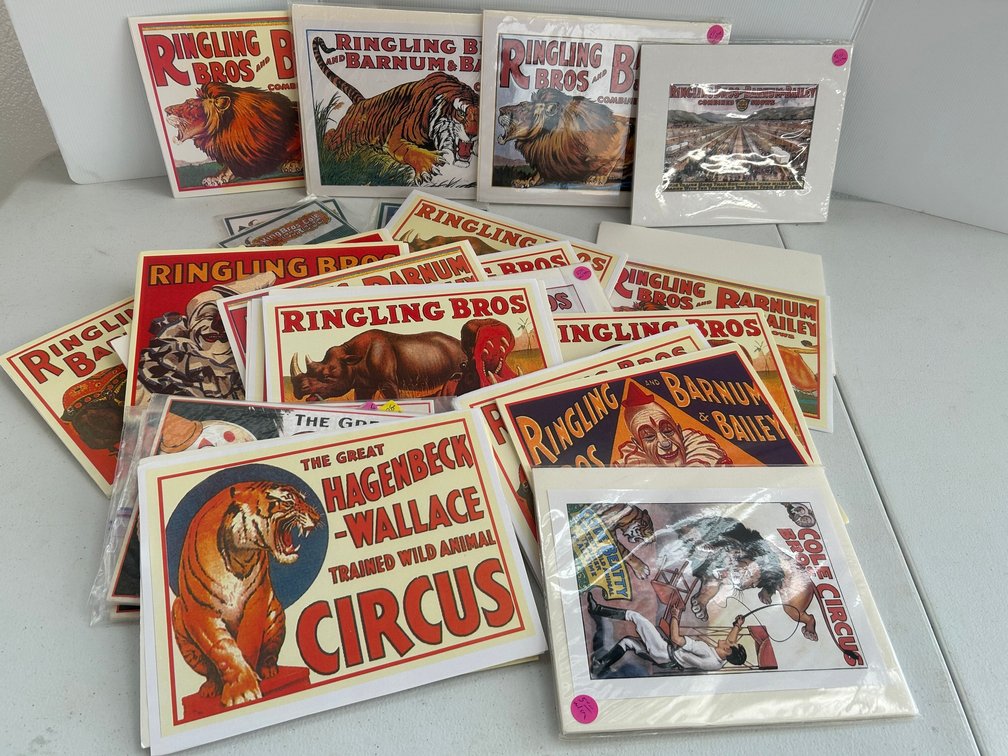 Selection of reprinted and foam core matted circus signs and advertisements
