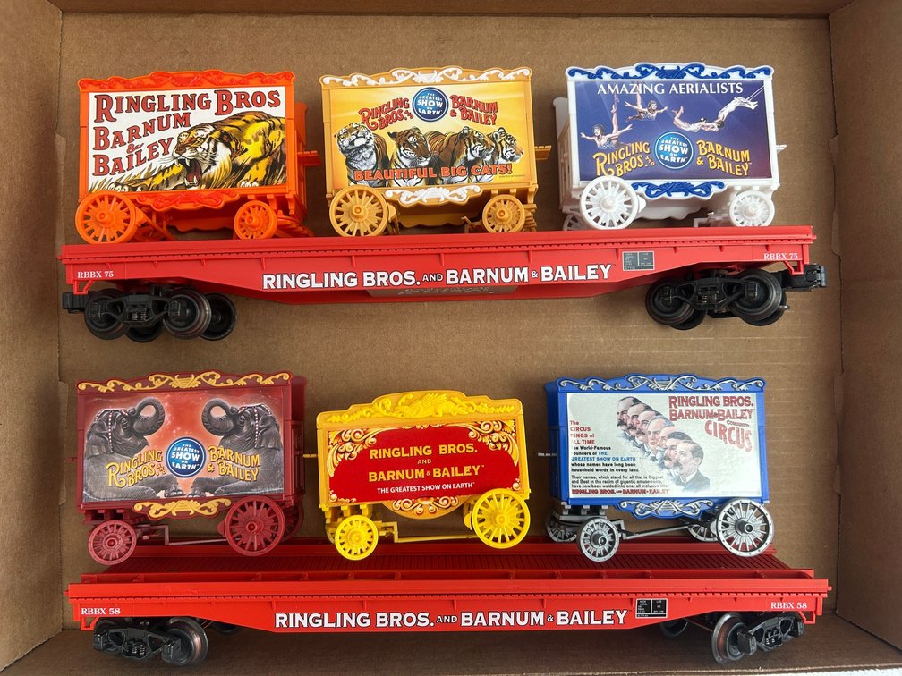 2 K-Line flat cars with 6 circus wagons