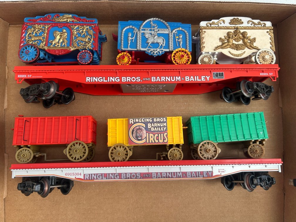 2 K-Line flat cars Ringling Bros. theme-with circus wagons