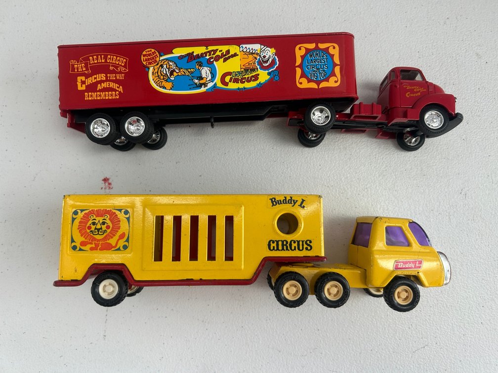 2 Circus theme toy trucks