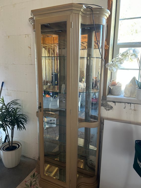 Lighted Curio Cabinet with Curved Glass on Sides and Glass shelves
