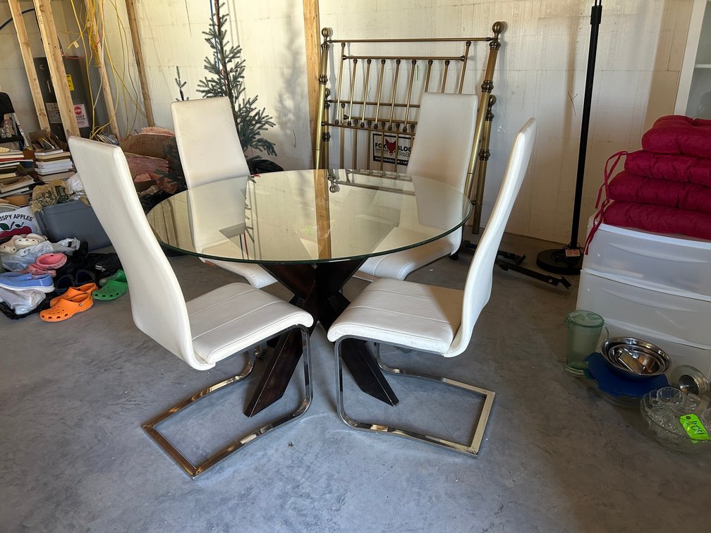 Contemporary round glass-top dining table