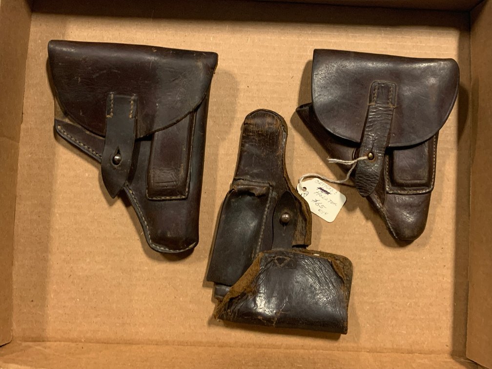 [3284]  Three Brown Leather Flap Holsters