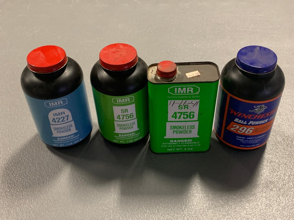 [2360]  Four Smokeless Powder Containers