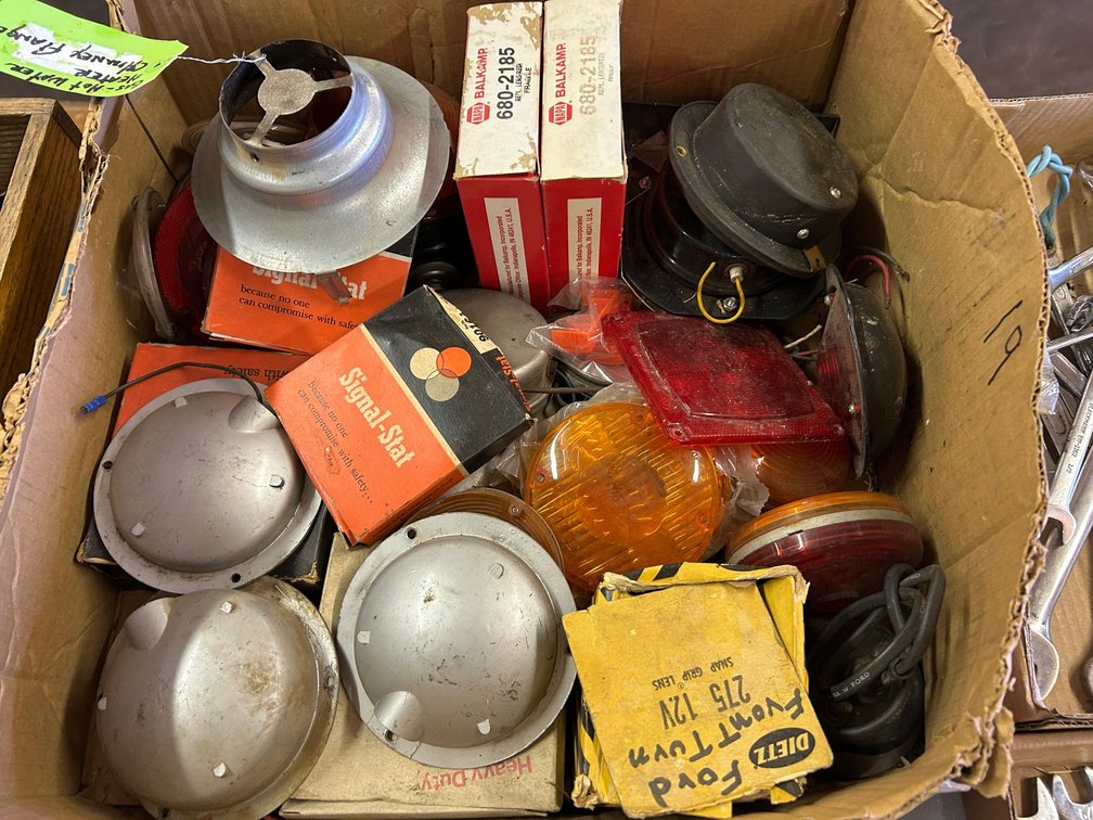 Vintage automotive lights, lenses, bezels, and wiring parts
