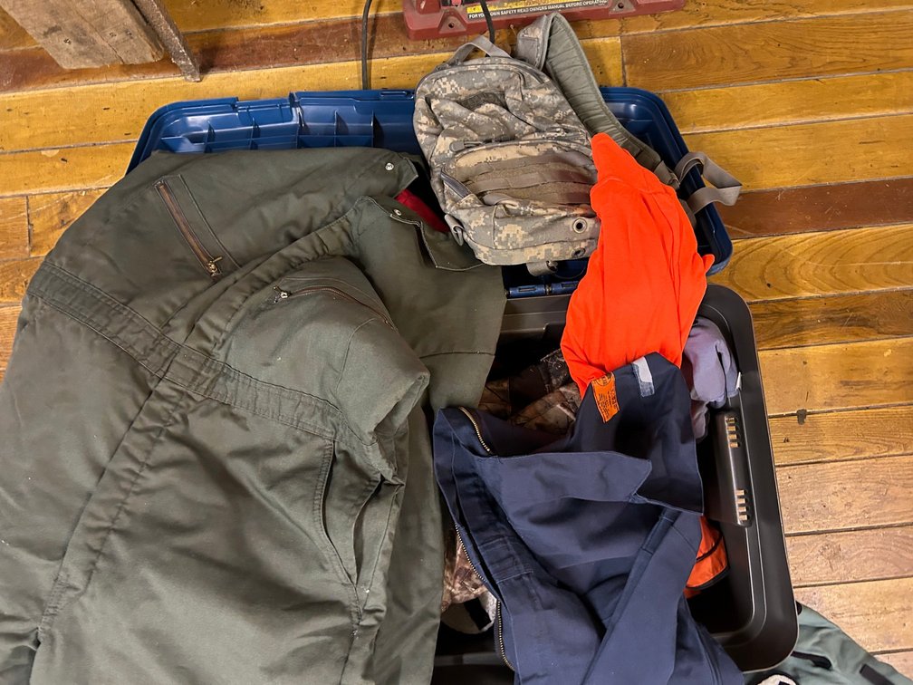 Tub with Camping and Hunting Clothing