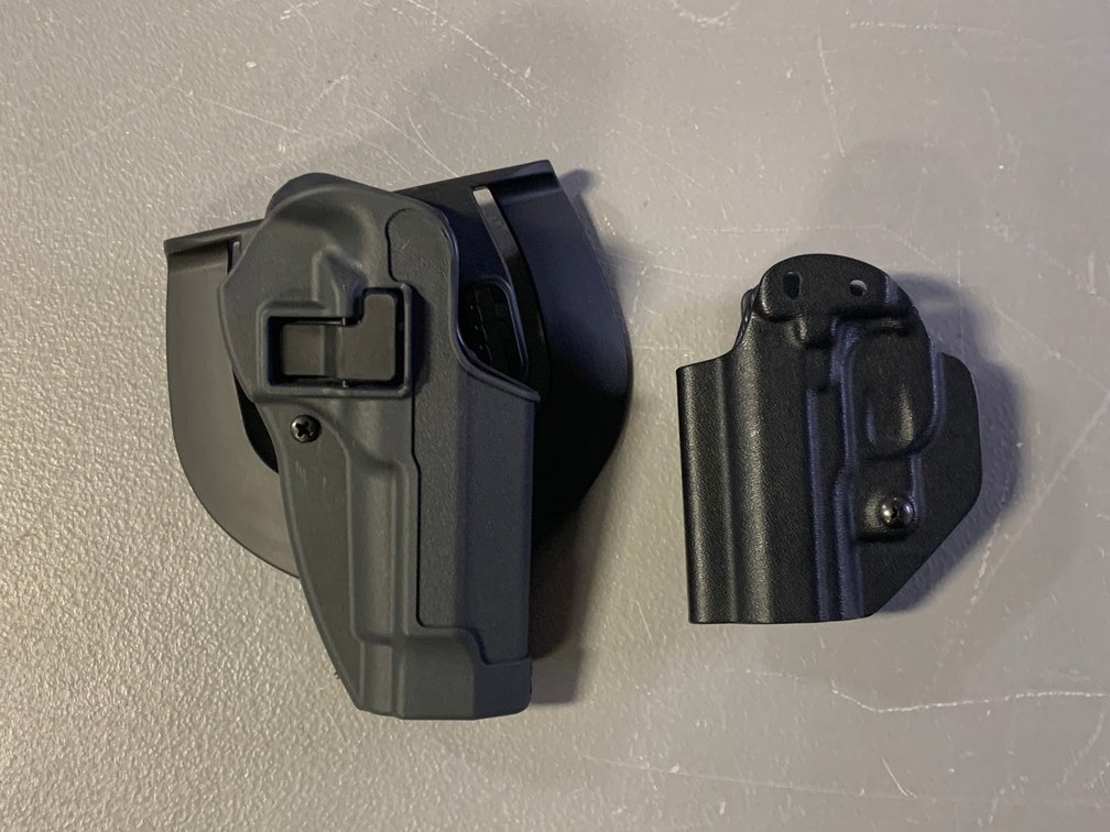 [3293]  Two Plastic Holsters