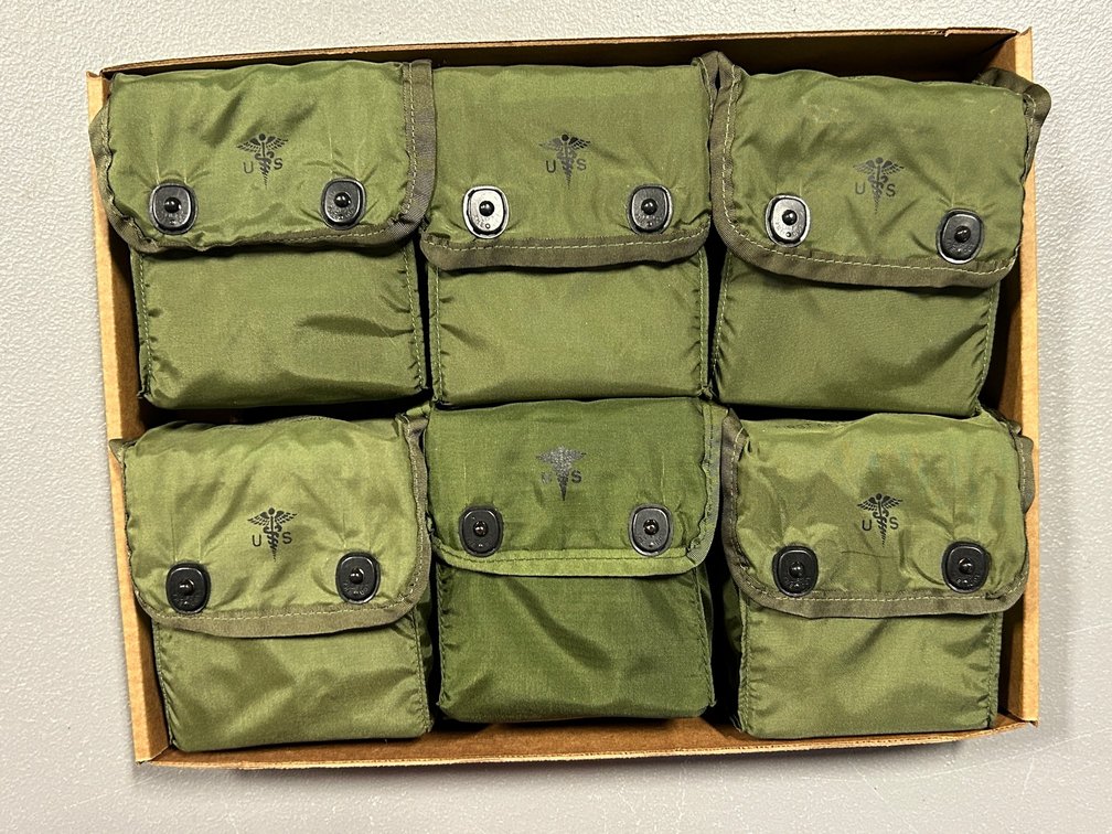 [3386]  Six US Surplus First Aid Kits