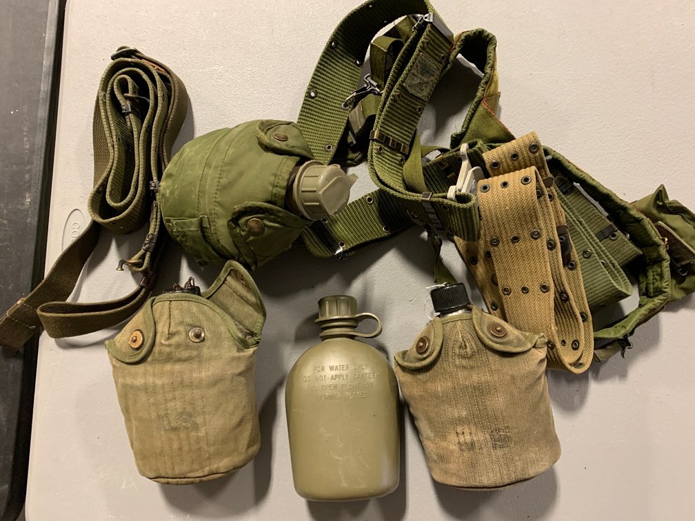 [3380]  Four Canteens with Hangers and Belts