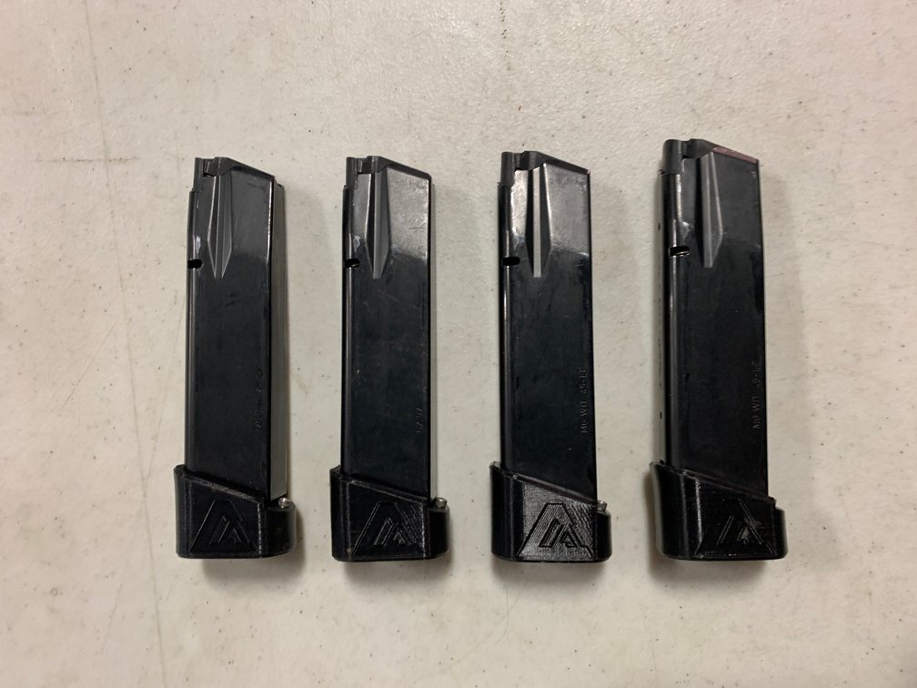 [3210]  Four Handgun Magazines