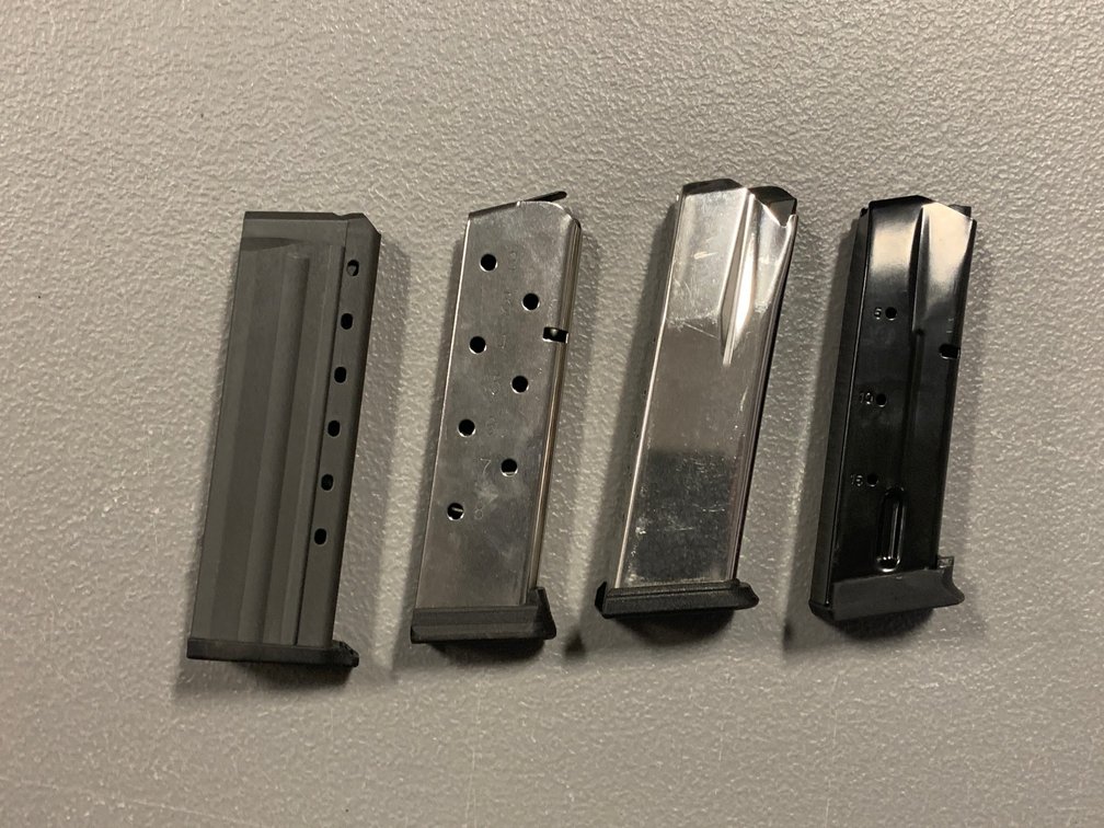 [3211]  Four Pistol Magazines