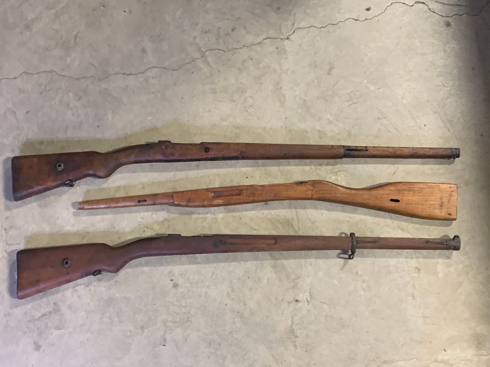 [3262]  Three Take Off Wooden Rifle Stocks
