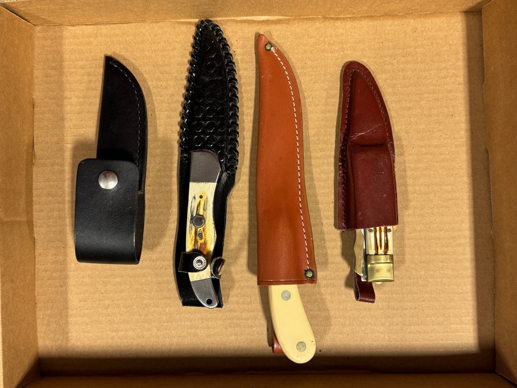 [3128]  Four Hunting Knives w/Sheaths